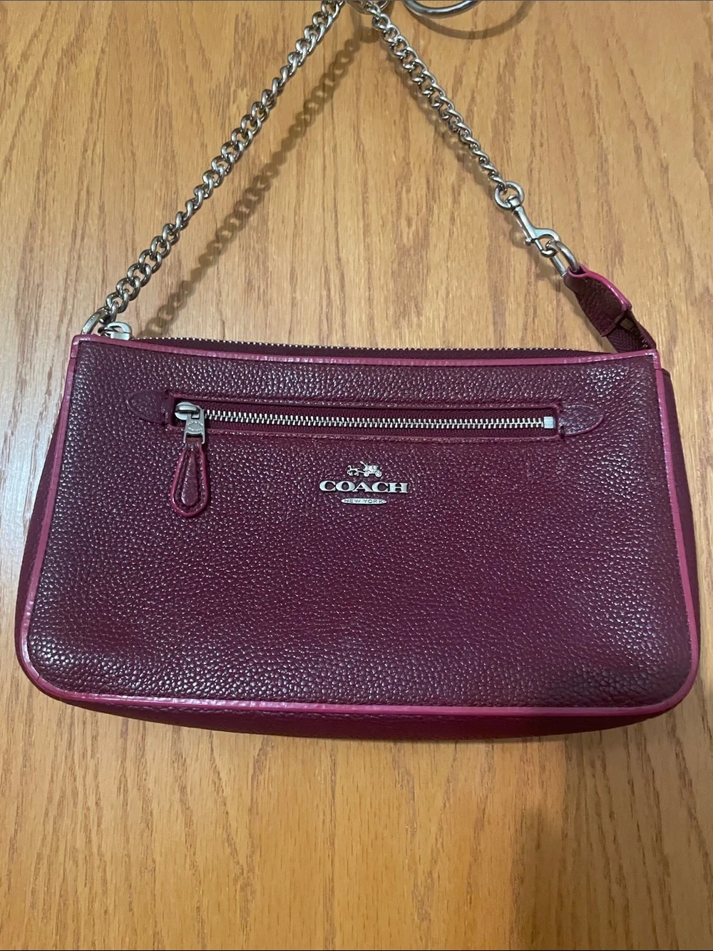 Coach Nolita 24 wristlet pebbled leather burgundy/oxblood
